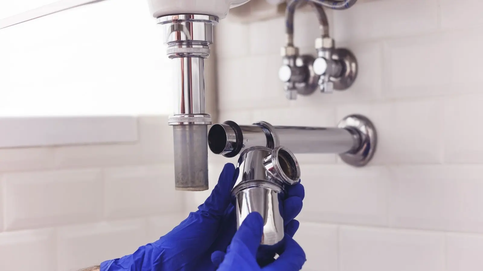 Plumbing repair near sink lines